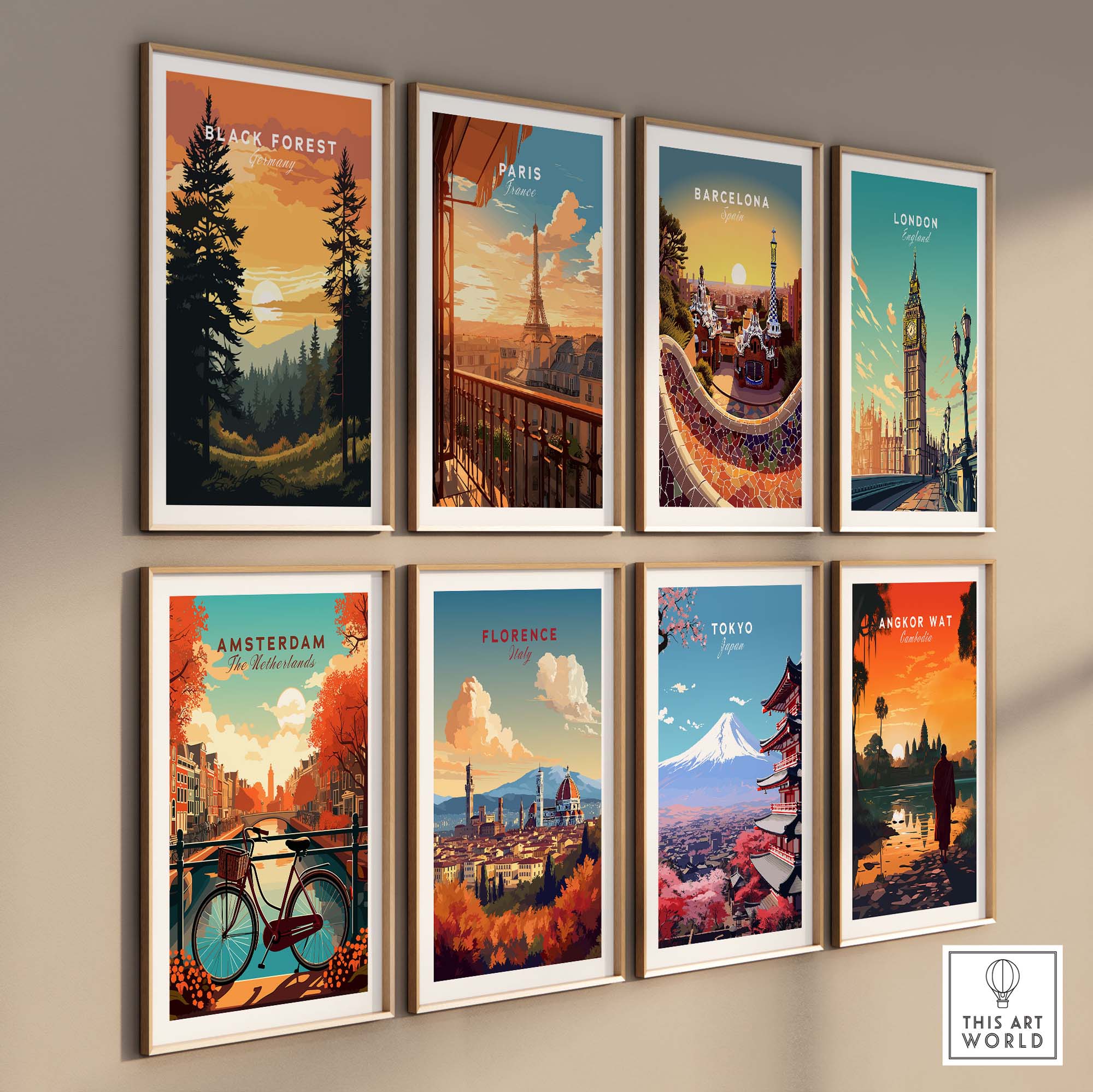 Gallery wall featuring travel posters: Black Forest, Paris, Barcelona, London, Amsterdam, Florence, Tokyo, and Angkor Wat.