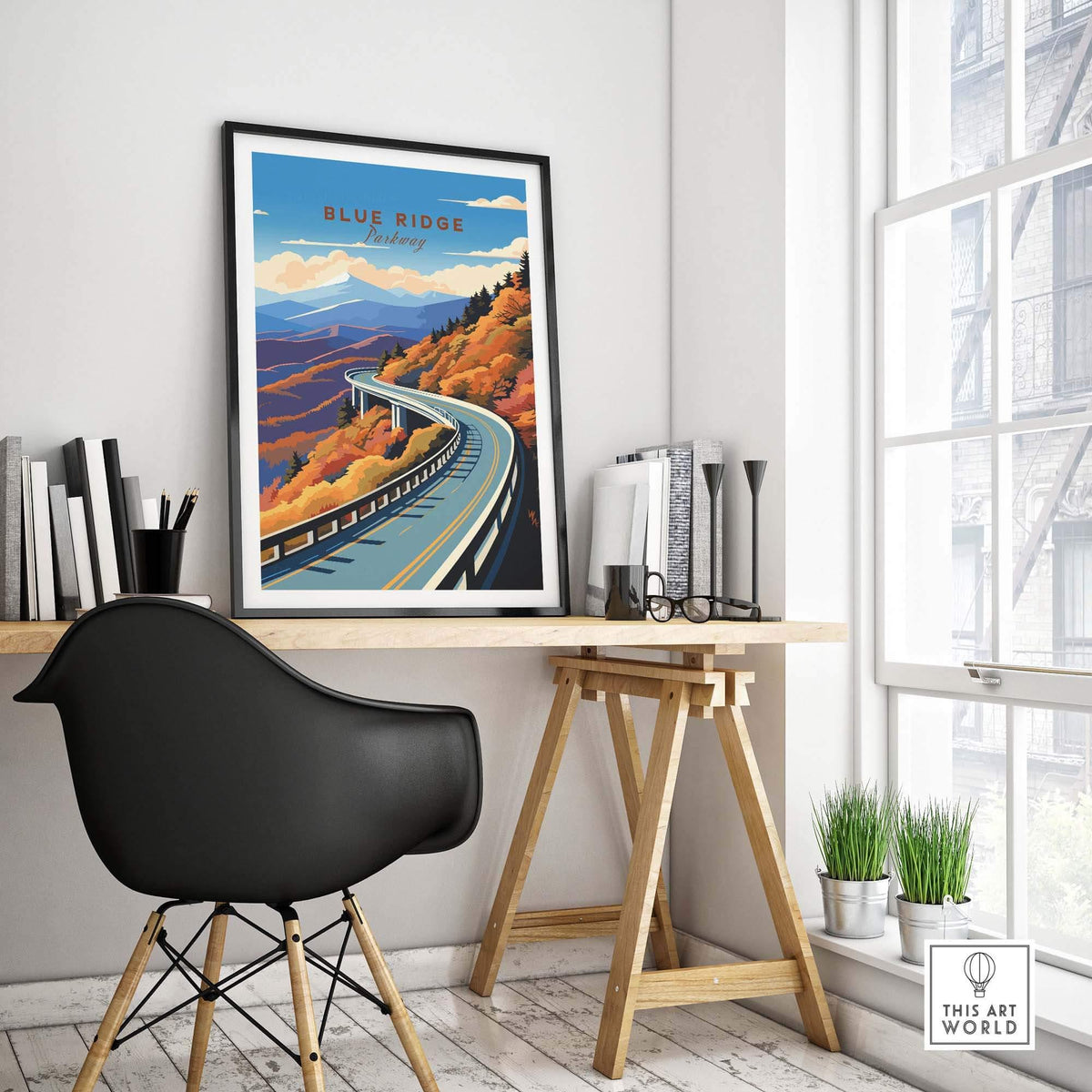 Blue Ridge Parkway poster displayed in a stylish home office setting, showcasing vibrant autumn colors and scenic road.