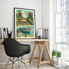 Bocas del Toro Panama travel poster with tropical hut, boat, and palm trees, framed above a desk in a bright home office.
