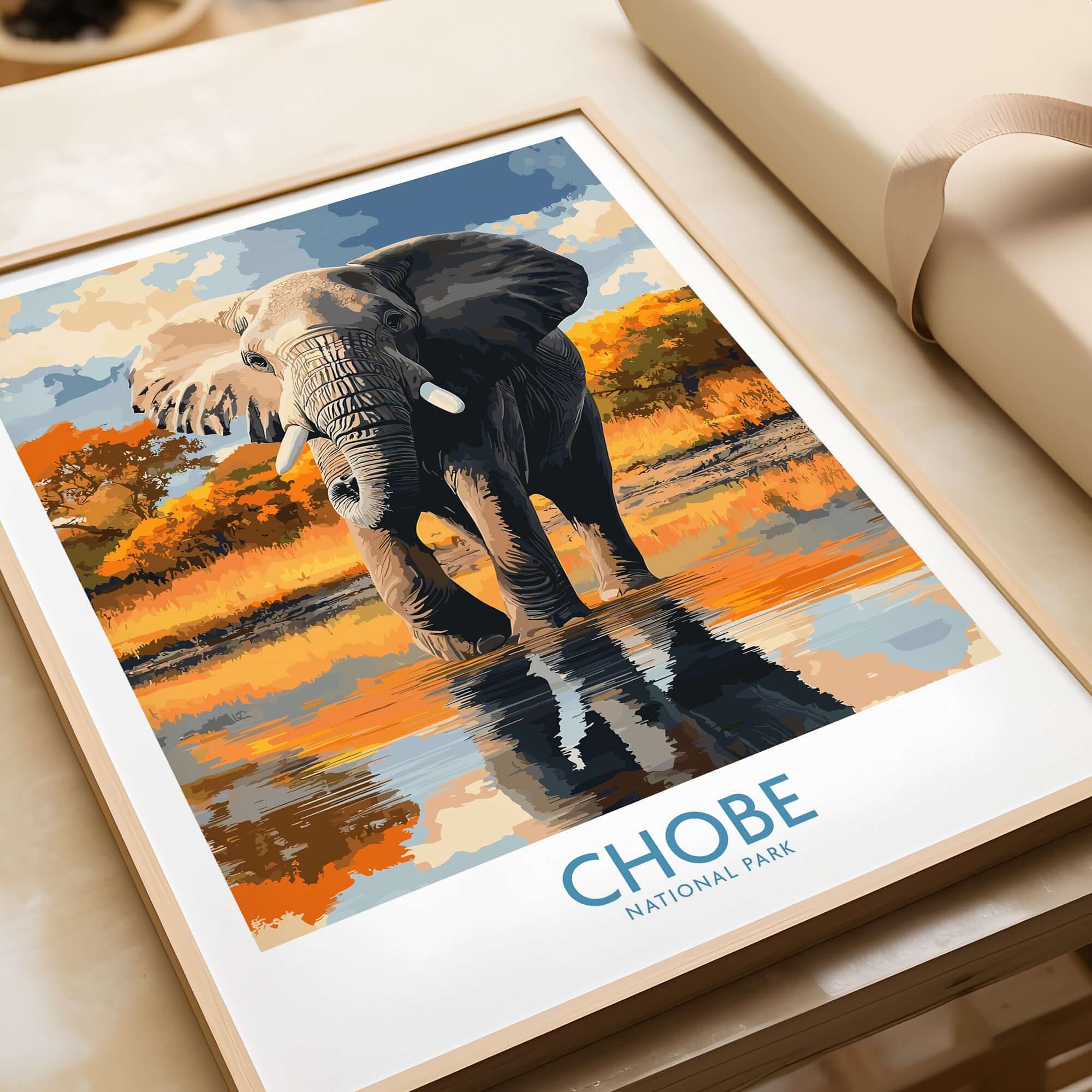 Botswana Elephant Print - Chobe National Park Wildlife Poster Wall Decor featuring an elephant by the water in Chobe National Park.
