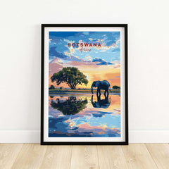 Botswana Elephant Sunset Art Print - African Wildlife Wall Decor featuring an elephant by a waterbody at sunset.