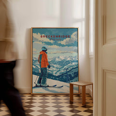 Breckenridge Travel Poster - Colorado featuring a skier gazing at the mountain landscape in a stylish home setting.