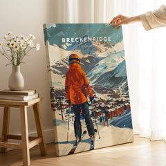 Breckenridge Ski Poster featuring a skier in an orange jacket overlooking Breckenridge, Colorado mountains.