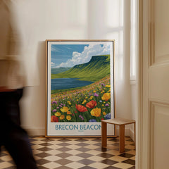Brecon Beacons Wales Mountain Lake Wall Art — framed canvas on floor man walking past