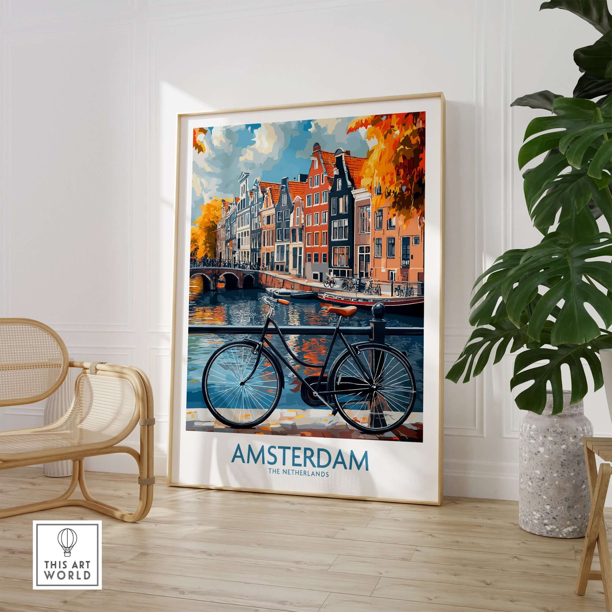 Bright Amsterdam Canal Poster - Colourful Dutch Houses Reflecting on Water Art displayed in a stylish interior with a bicycle.