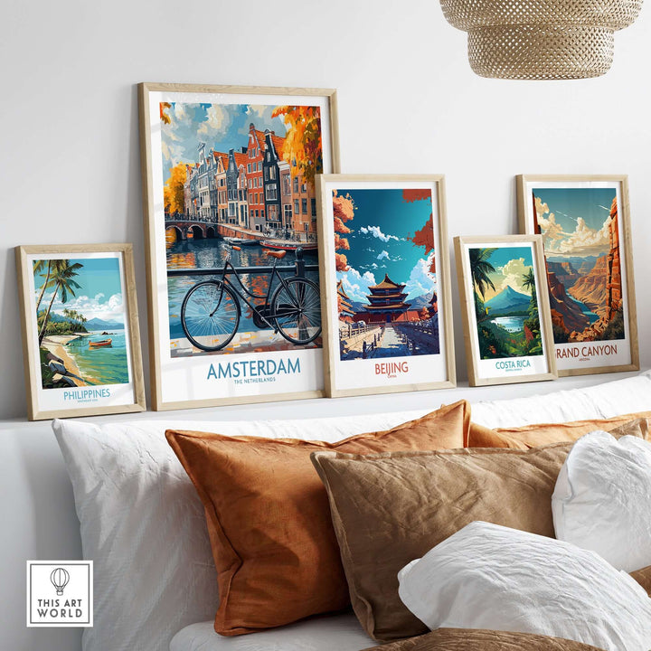 Collection of vibrant travel posters featuring Amsterdam, Beijing, Costa Rica, Grand Canyon, and Philippines on a stylish wall.
