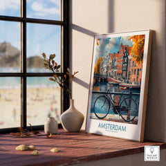 Bright Amsterdam Canal Poster - Colourful Dutch Houses Reflecting on Water Art displayed in a sunlit room with a bicycle.