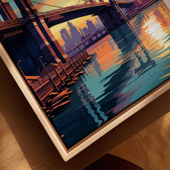 Brooklyn Bridge Print depicting vibrant sunset reflections in the water with urban skyline backdrop.