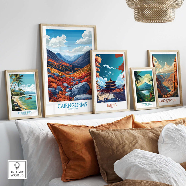 Framed Cairngorms art print displayed with other travel-themed prints in a stylish living room setting.