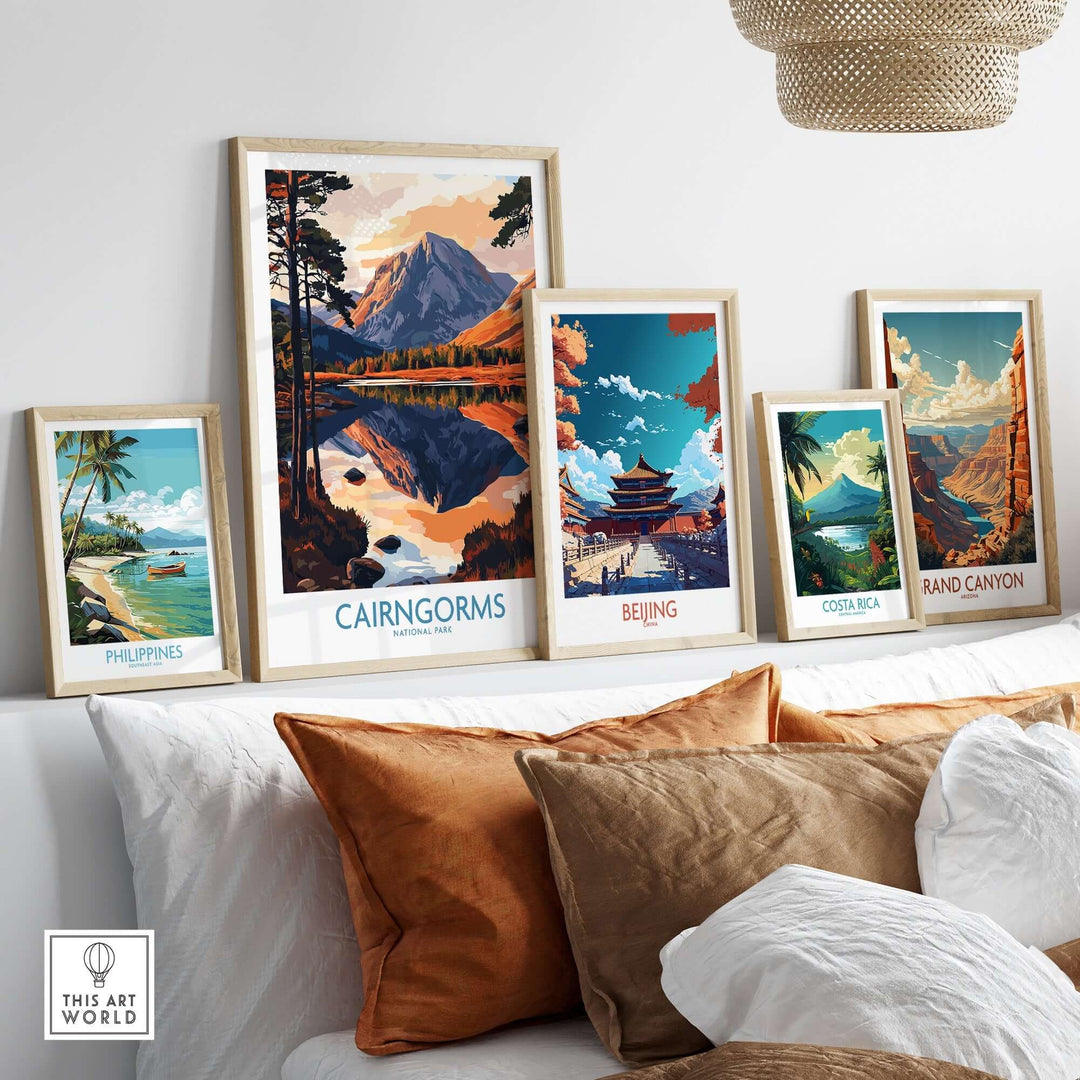 Collection of framed travel posters including Cairngorms, Philippines, Beijing, Costa Rica, and Grand Canyon in a stylish setting.