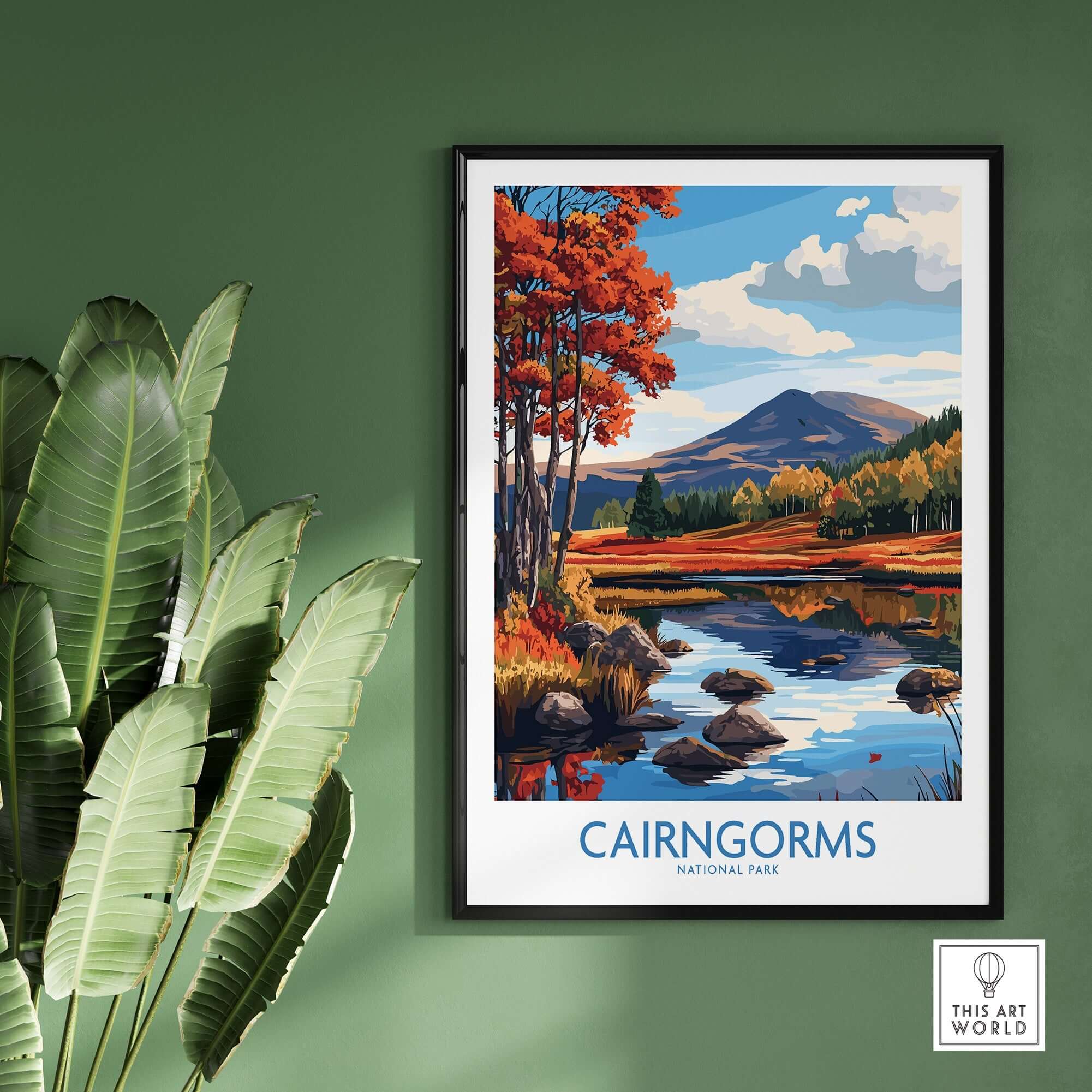Cairngorms National Park Wall Art Print showcasing vibrant autumn colors and serene landscape on a green wall.