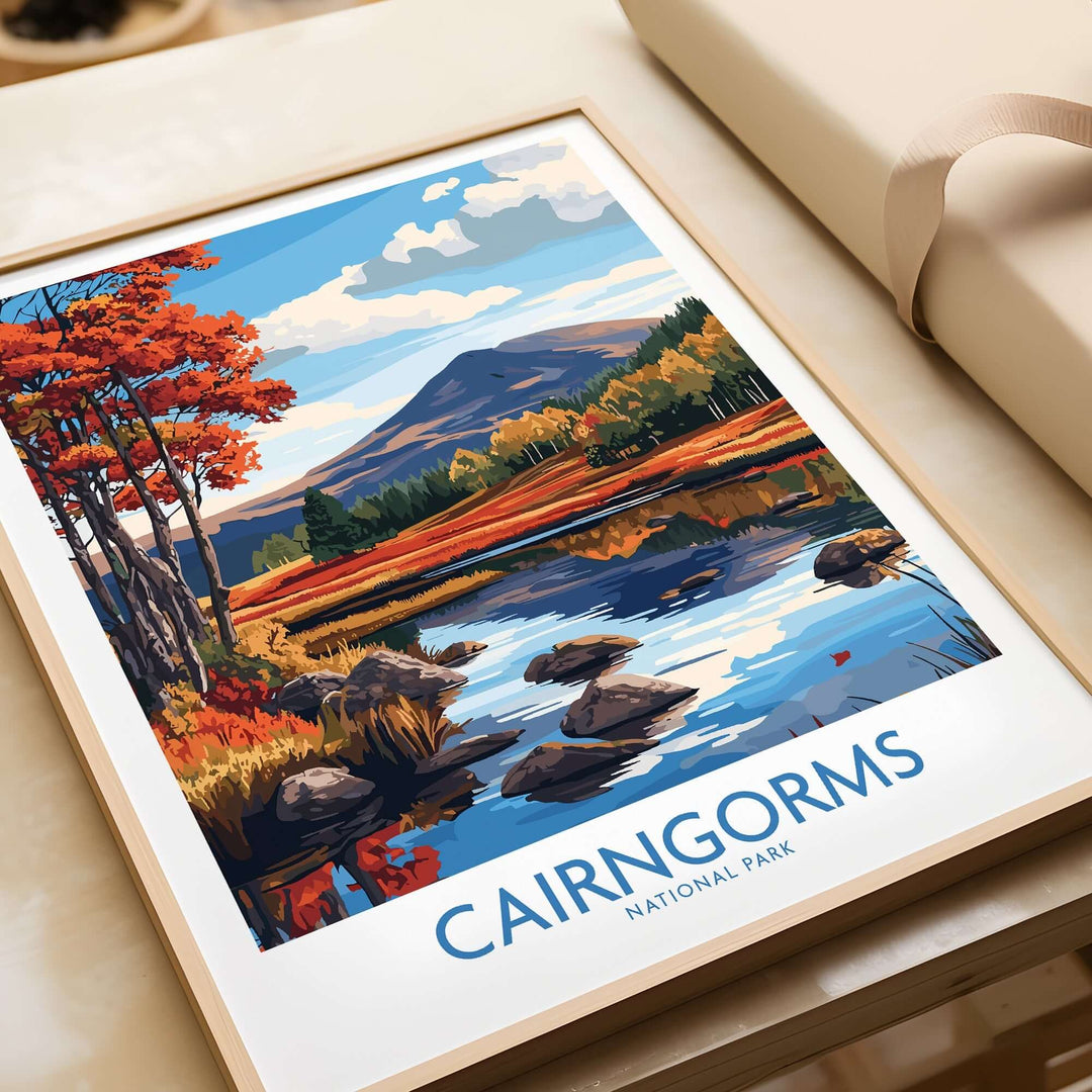 Cairngorms National Park wall art print featuring vibrant autumn colors and a serene landscape with mountains and reflections in water.