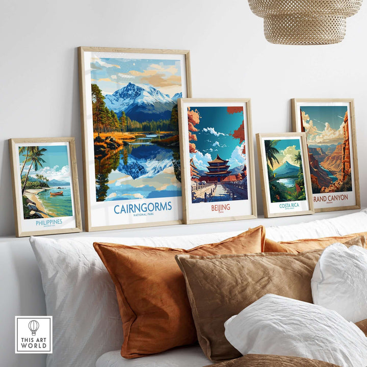 Cairngorms National Park poster among other travel posters displayed on a modern wall, showcasing scenic landscapes.