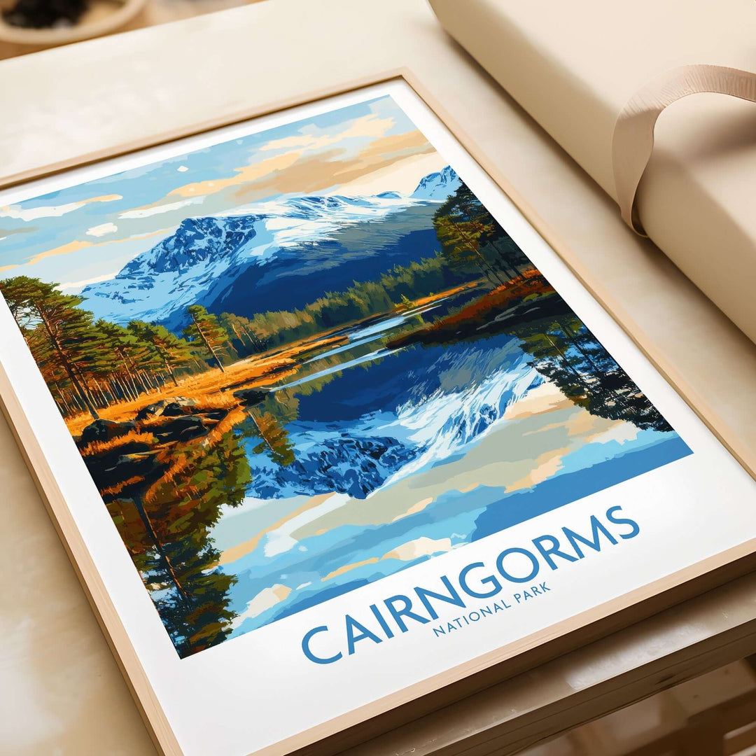 Cairngorms National Park poster featuring a scenic landscape with mountains and a reflective lake, framed and ready for display.