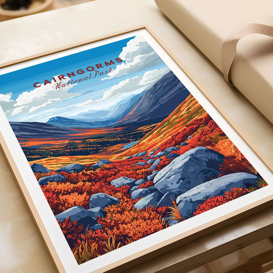 Vibrant Cairngorms National Park print featuring rolling hills, vibrant foliage, and rocky landscape, displayed in a frame.