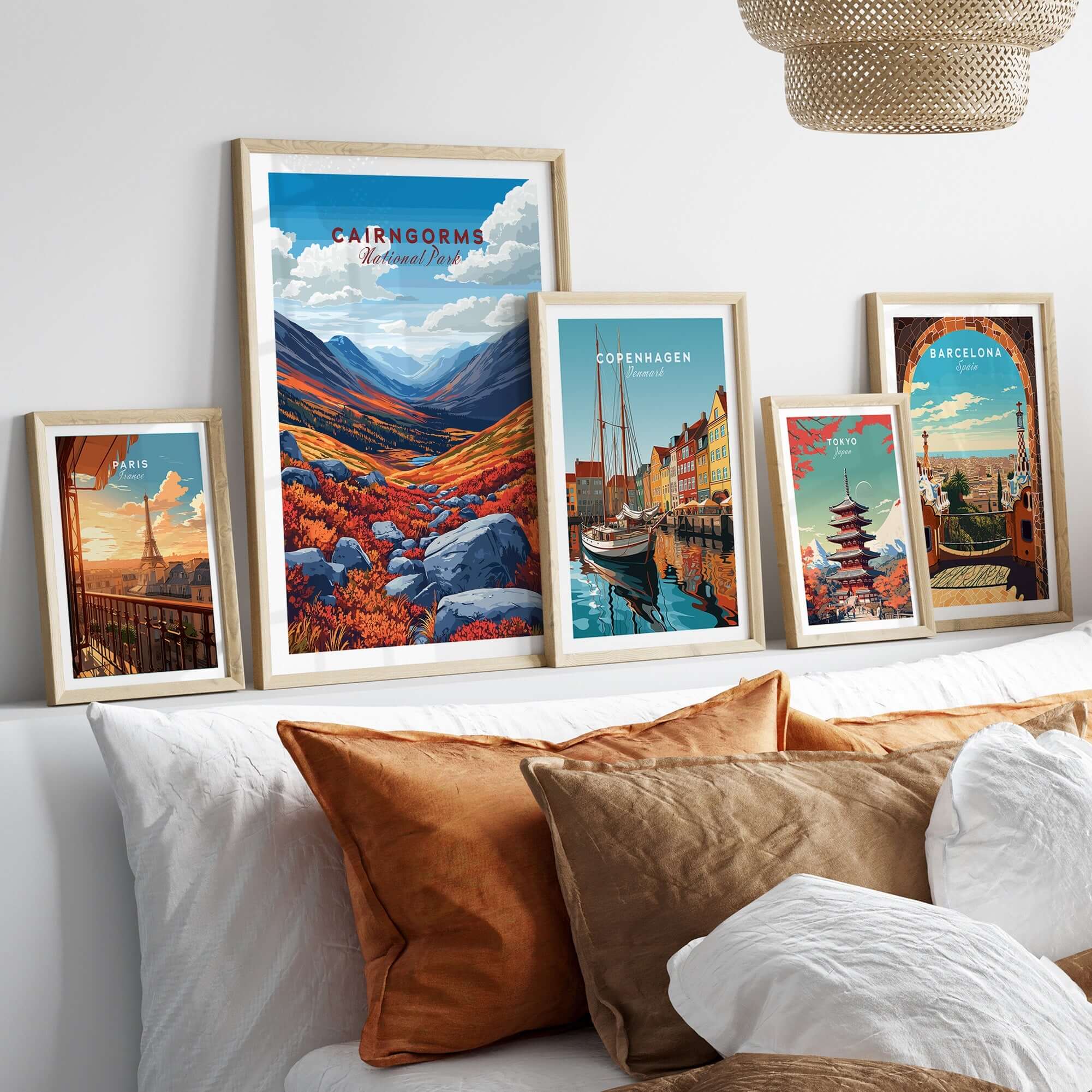 Cairngorms Print displayed among other vibrant travel art prints in a stylish home setting.
