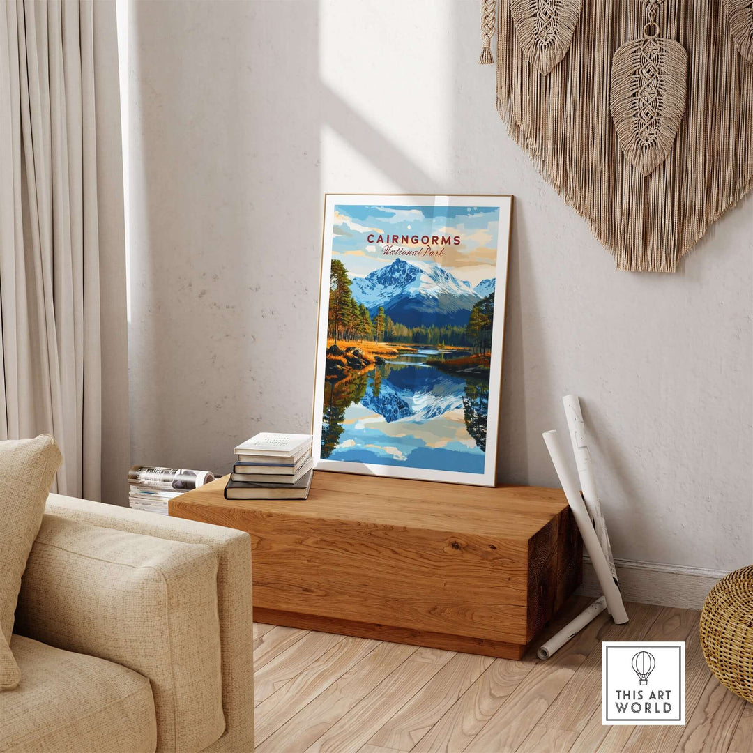 Cairngorms print showcasing beautiful mountains and lake, displayed in a cozy living room setting.