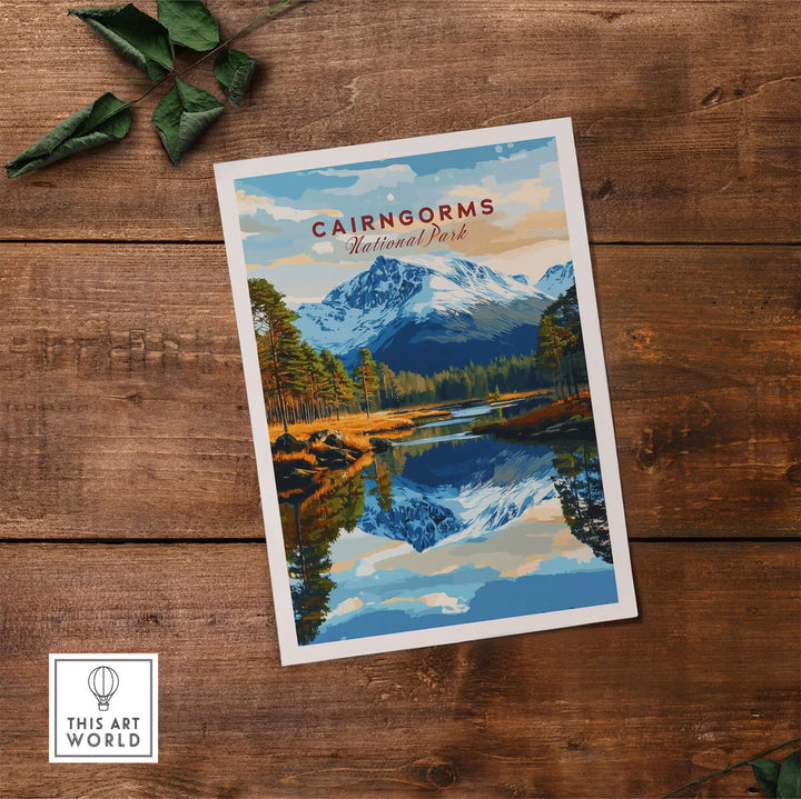 Cairngorms National Park art print featuring mountains, trees, and reflections on a lake, set on a rustic wooden background.