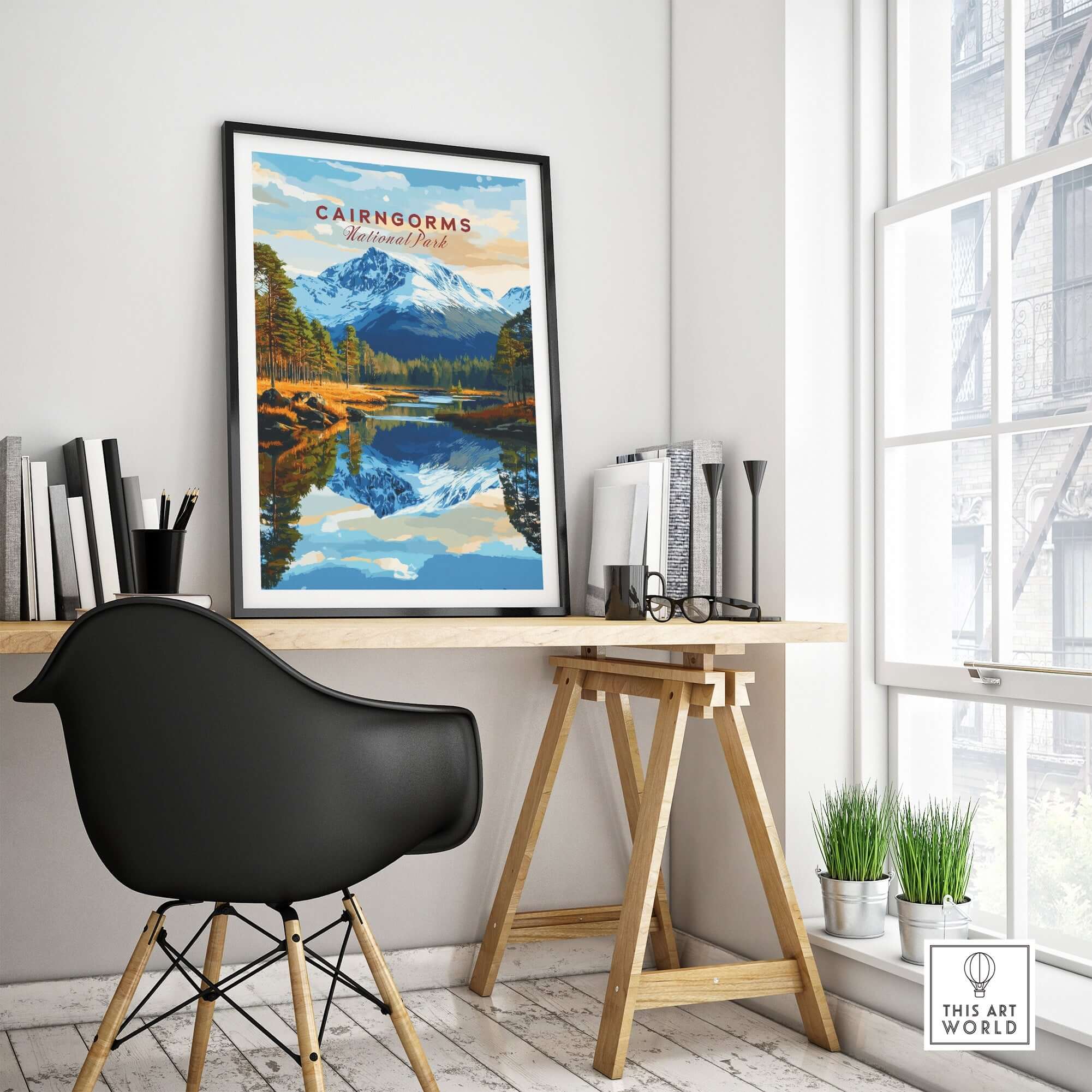 Cairngorms Print National Park framed in a modern workspace, showcasing Scotland's beautiful landscapes.