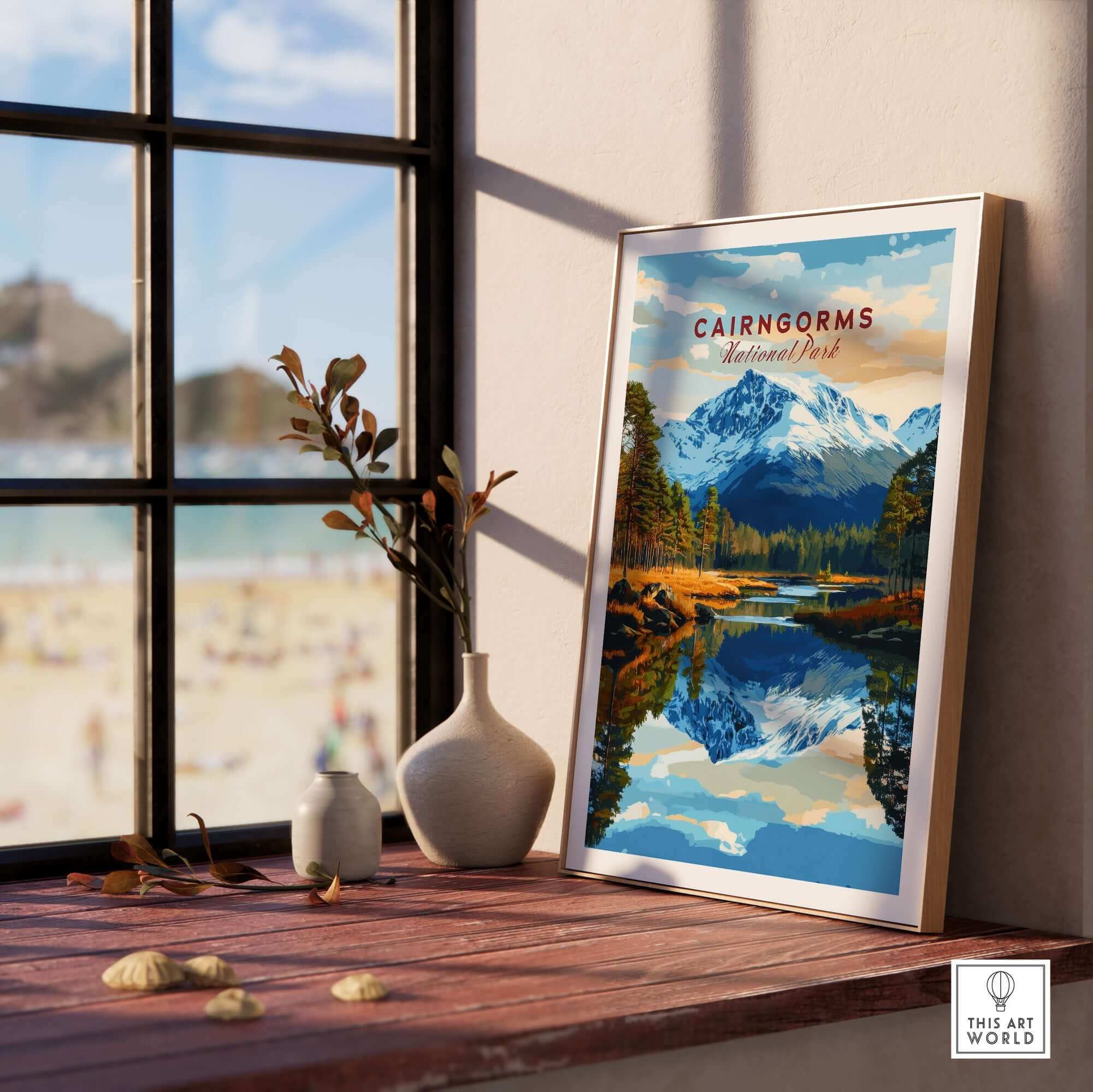 Cairngorms Print National Park displayed in a stylish frame on a windowsill with a scenic view.