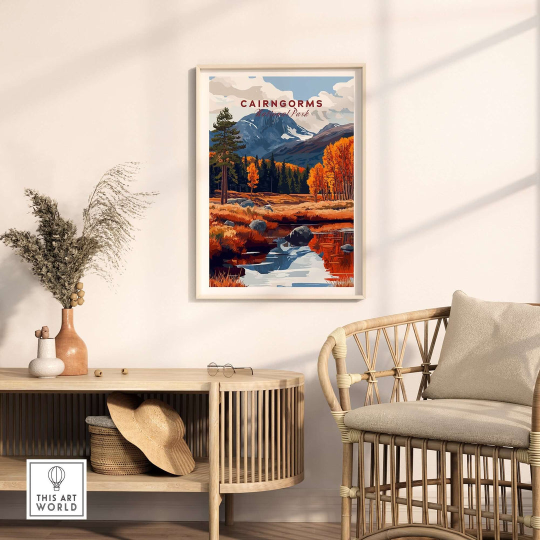 Cairngorms travel print featuring vibrant autumn colors, mountains, and a serene river, displayed in a modern interior setting.