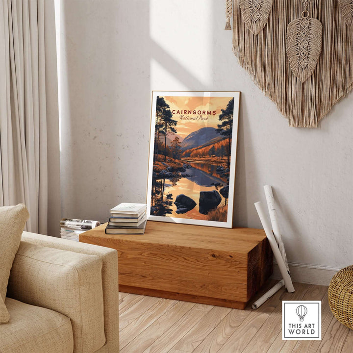 Cairngorms wall art displayed in a modern living room, featuring a serene landscape of mountains and a reflective lake.