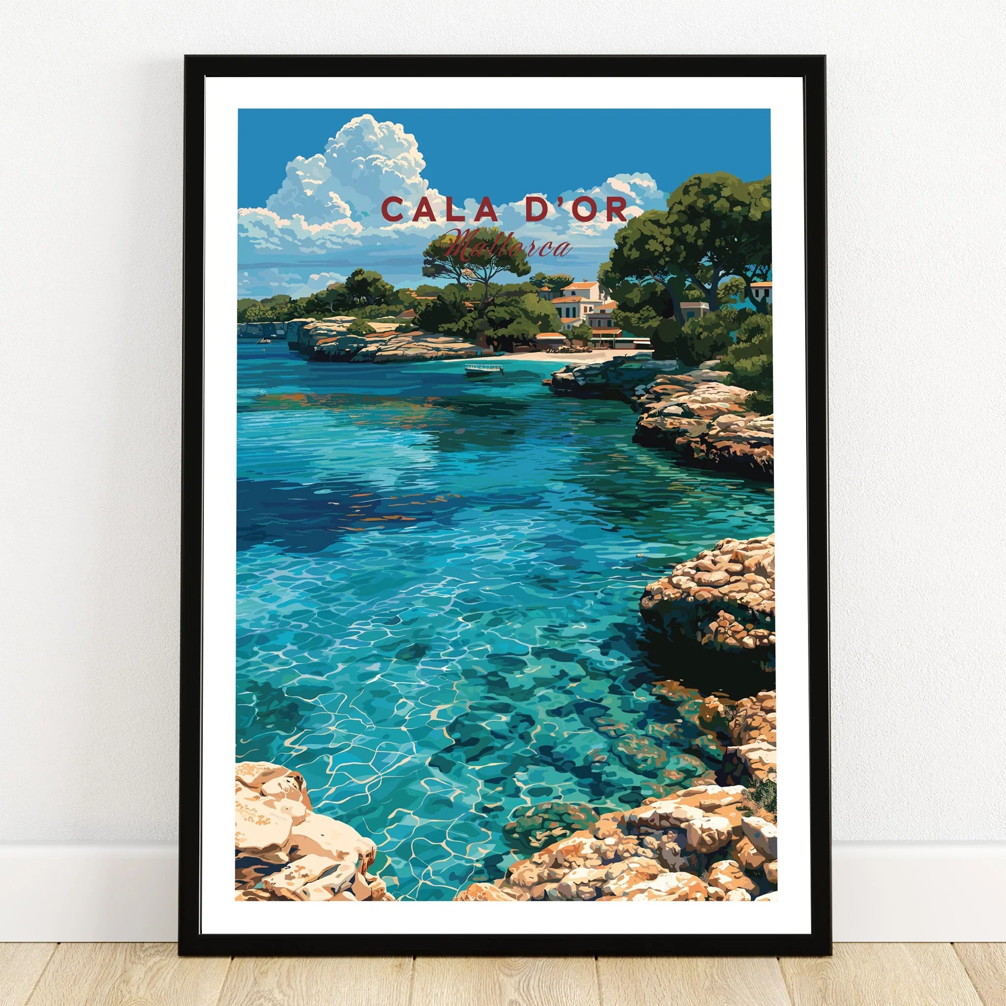 Cala d'Or Mallorca Cove Travel Poster — art print in black frame on wooden floor