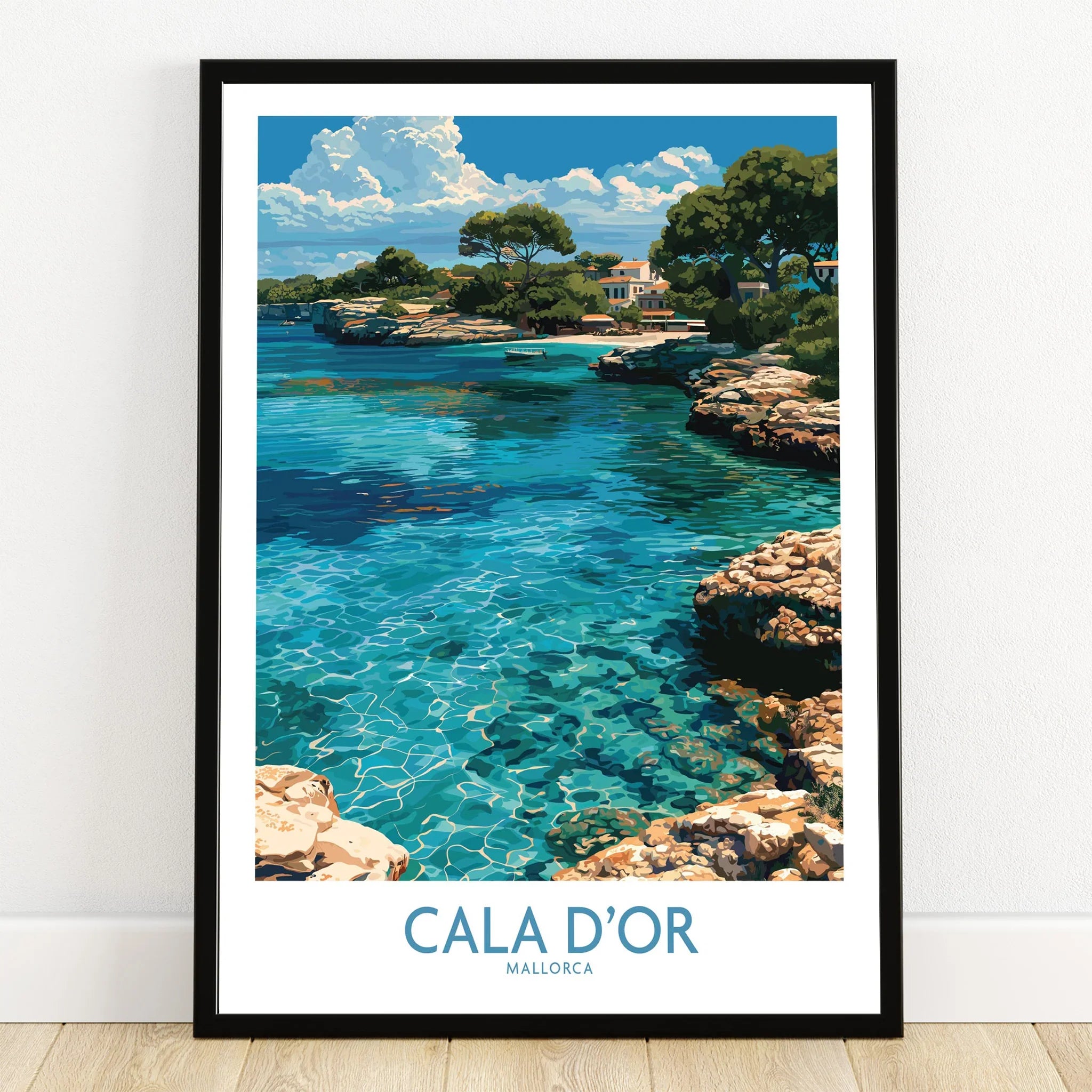 Cala d'Or Mallorca Cove Wall Art — art print in black frame on wooden floor