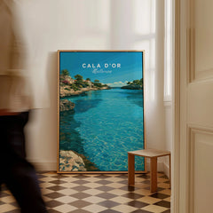Cala d'Or Mallorca Bay Travel Poster — framed canvas on floor man walking past