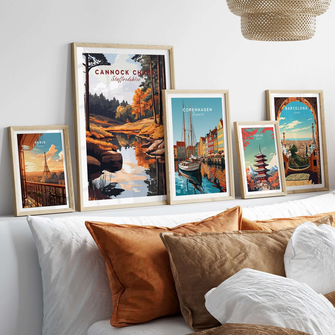 Collection of vibrant art prints including Cannock Chase, displayed on a stylish couch with decorative pillows.