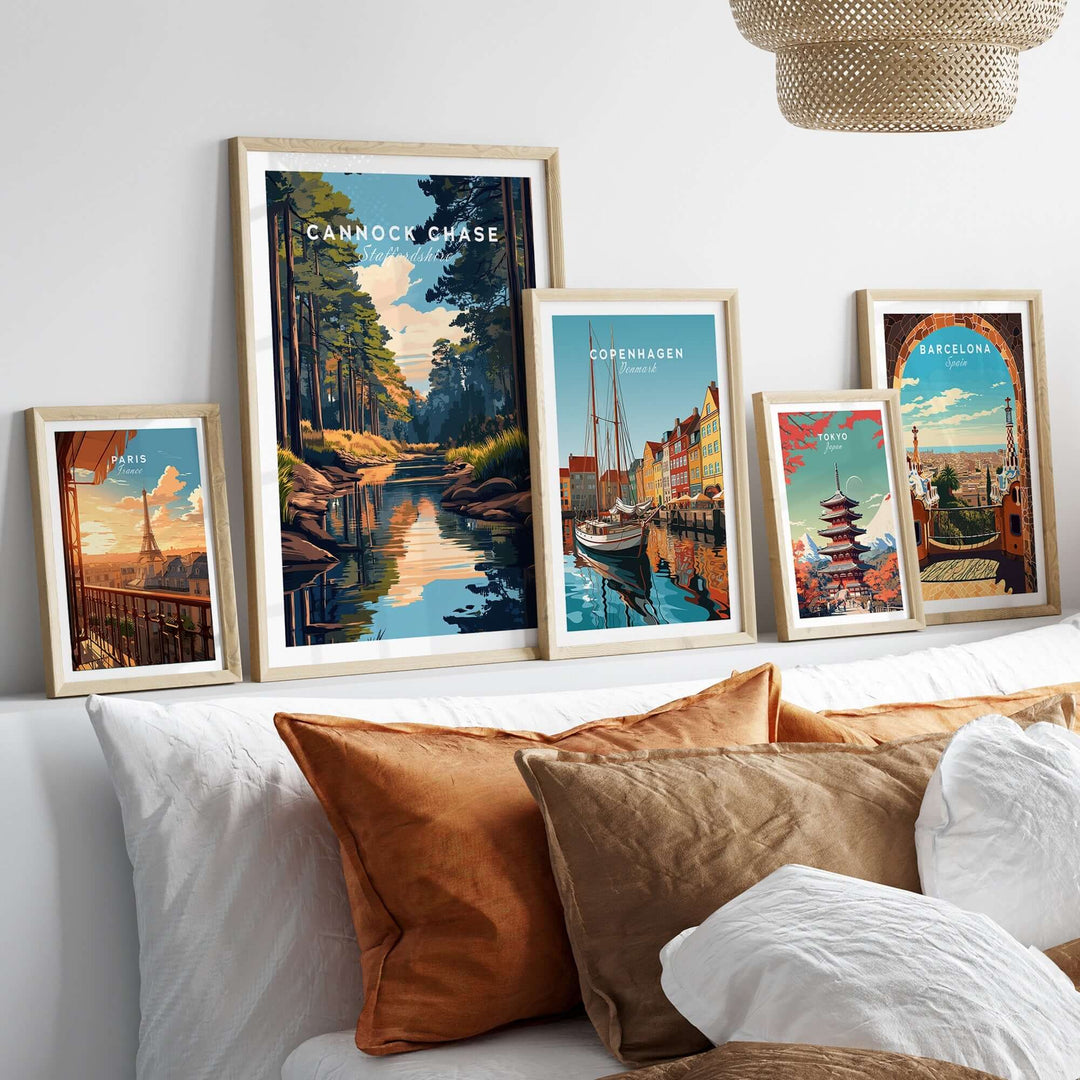 Cannock Chase travel print displayed among other city travel prints on a stylish sofa, enhancing home decor with wanderlust.