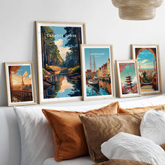 Cannock Chase Staffordshire England Travel Print alongside framed travel artwork on a cozy sofa.