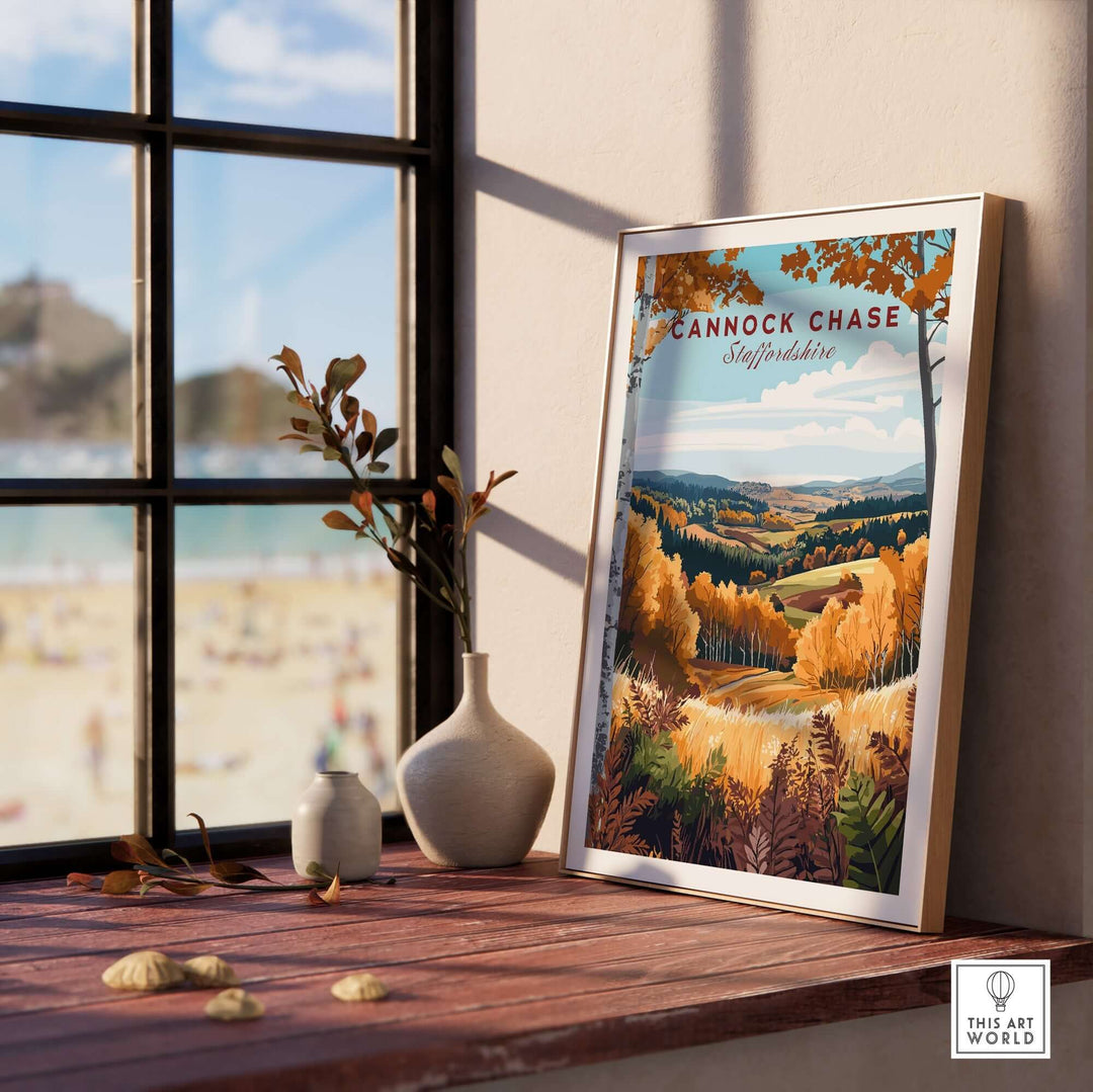 Cannock Chase travel print displayed on a wooden table, showcasing autumn colors and scenic landscapes.