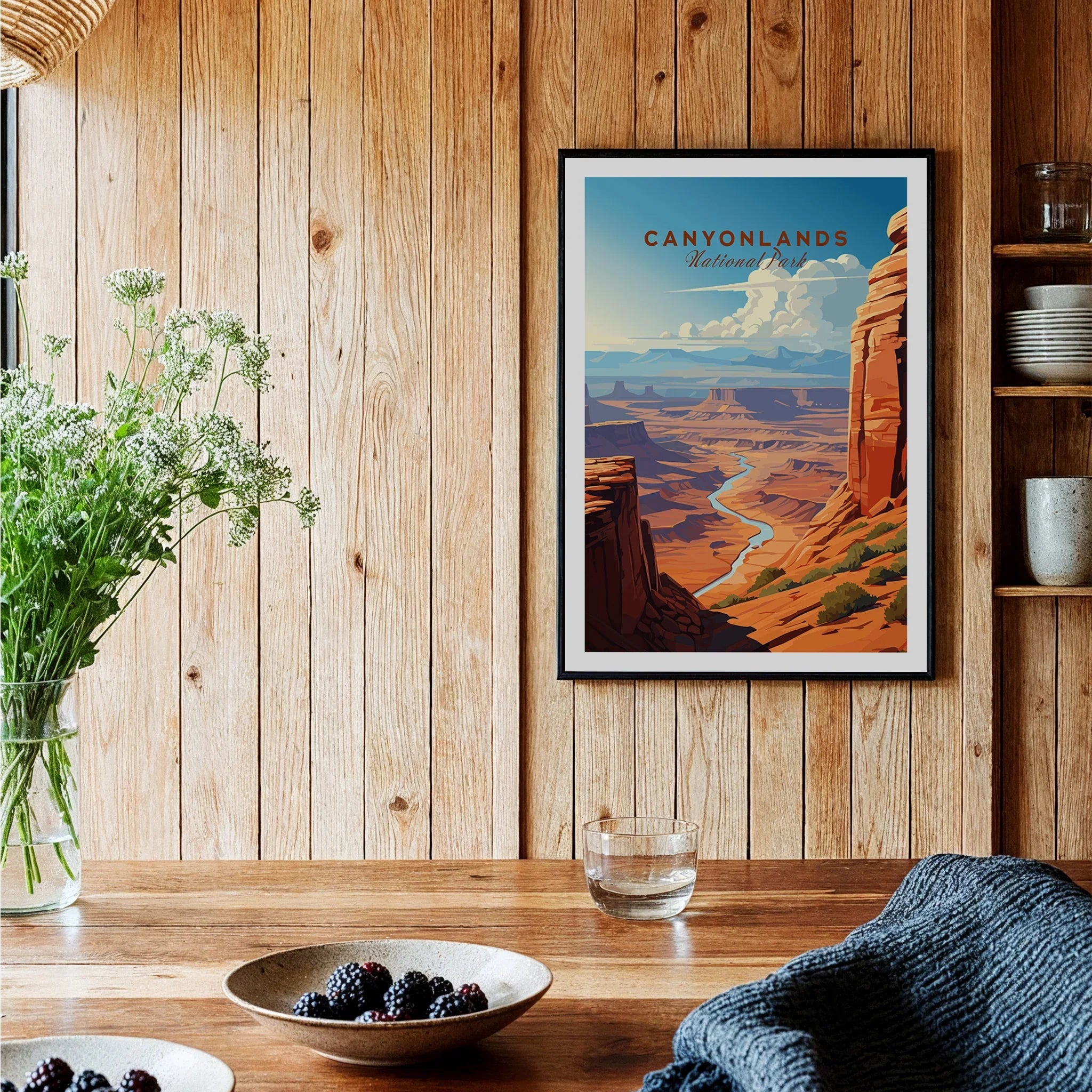 Framed Canyonlands National Park art print on wood wall in rustic kitchen setting