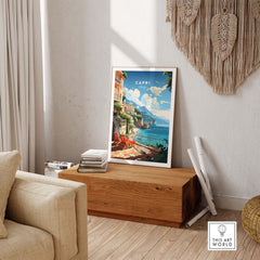 Capri Italy poster print displayed in a cozy living room, showcasing vibrant coastal scenery and Mediterranean charm.
