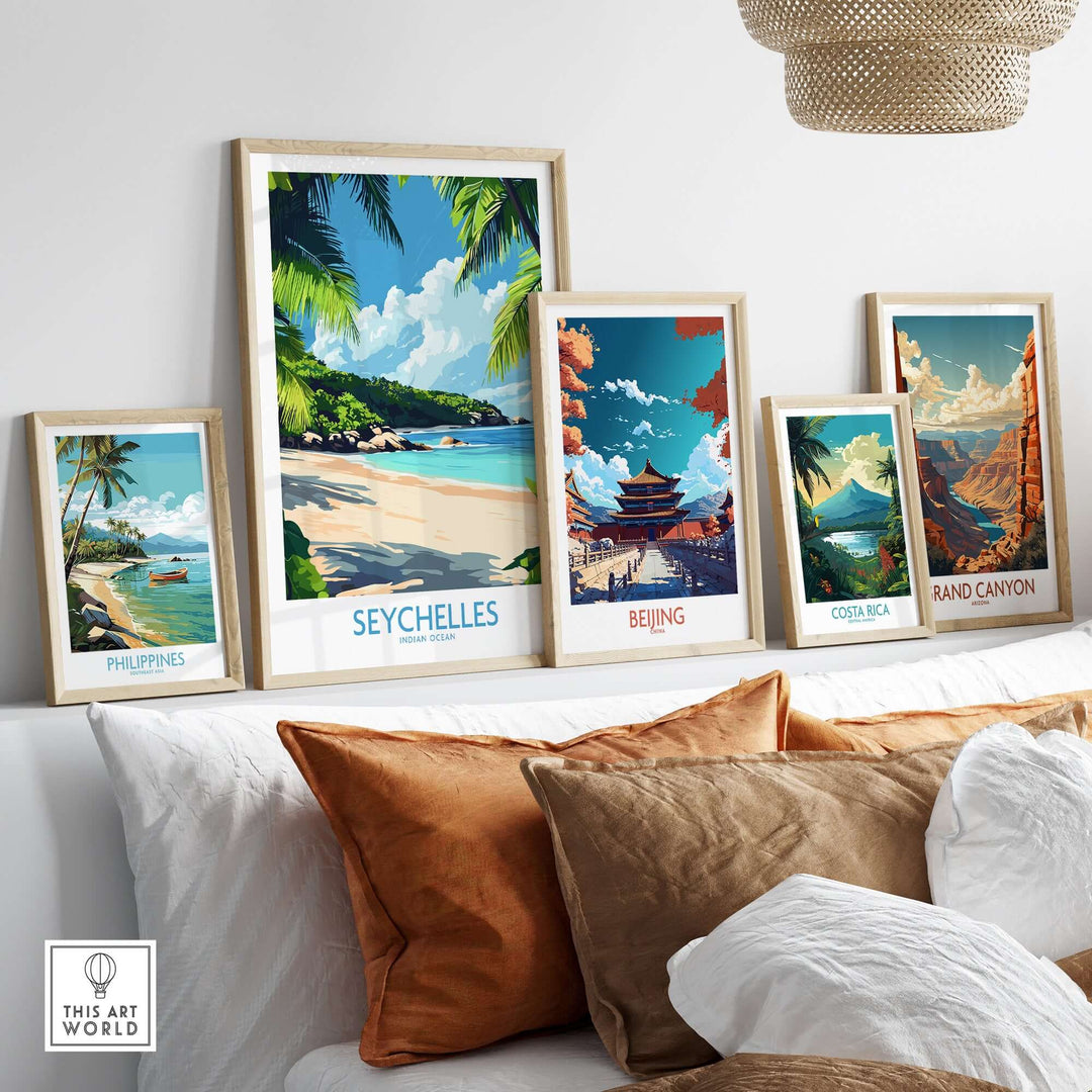 Colorful travel prints including Seychelles, Philippines, Beijing, Costa Rica, and Grand Canyon art pieces displayed in a cozy setting.