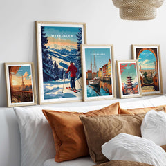 Myrkdalen ski poster displayed among travel prints in a cozy home setting with decorative pillows.