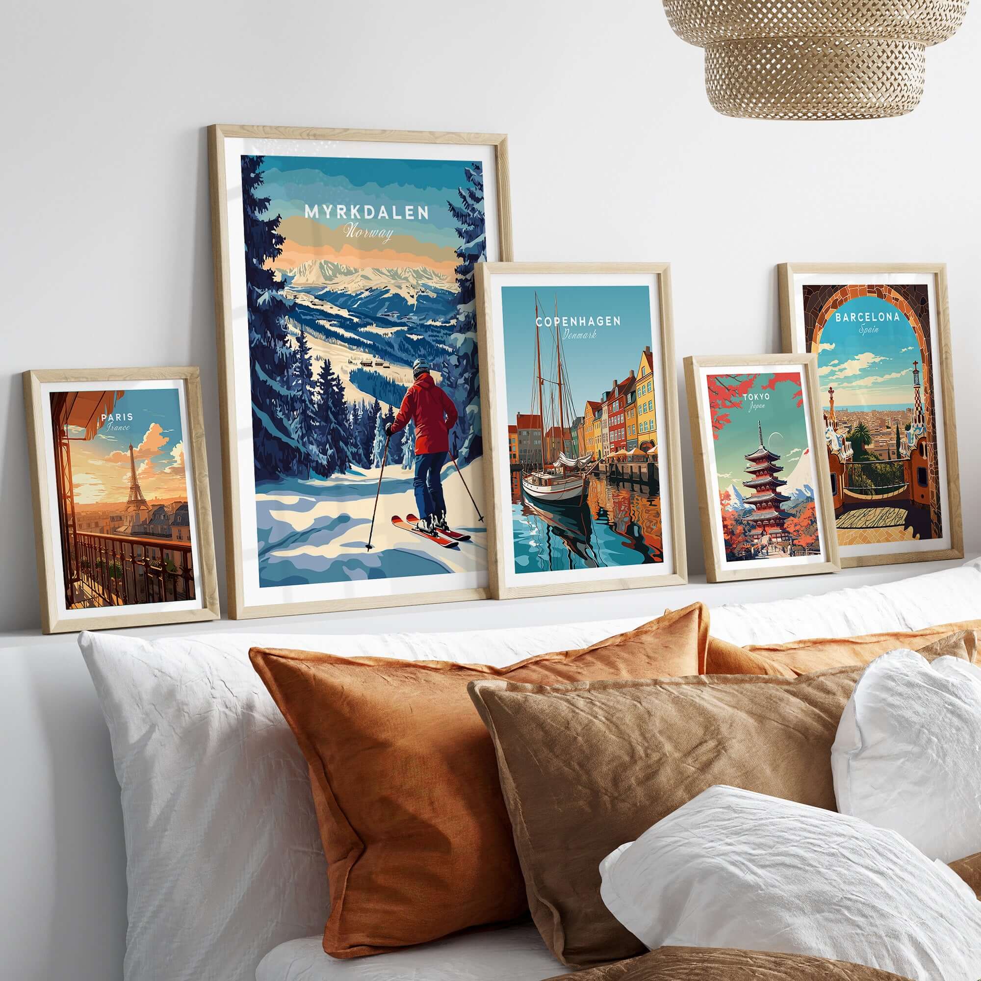 Myrkdalen ski poster displayed among travel prints in a cozy home setting with decorative pillows.