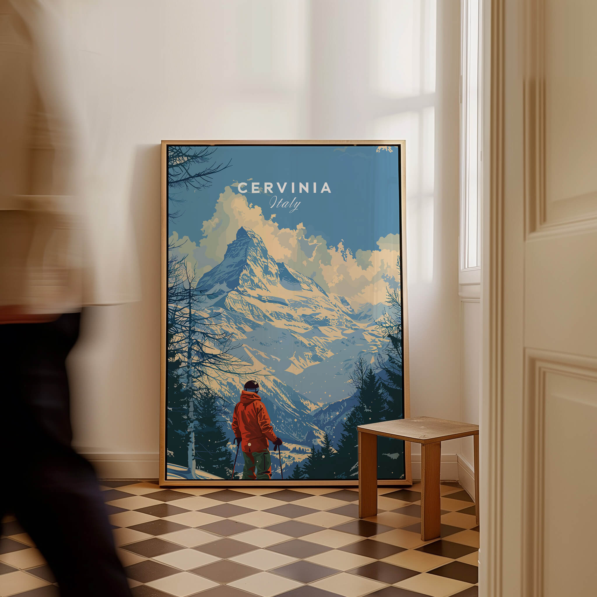 Cervinia Ski Print - Italy framed poster featuring a mountain scene and skier in a cozy interior.