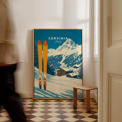 Cervinia Ski Wall Art Print featuring colorful skis and stunning mountain backdrop in a stylish room setting.