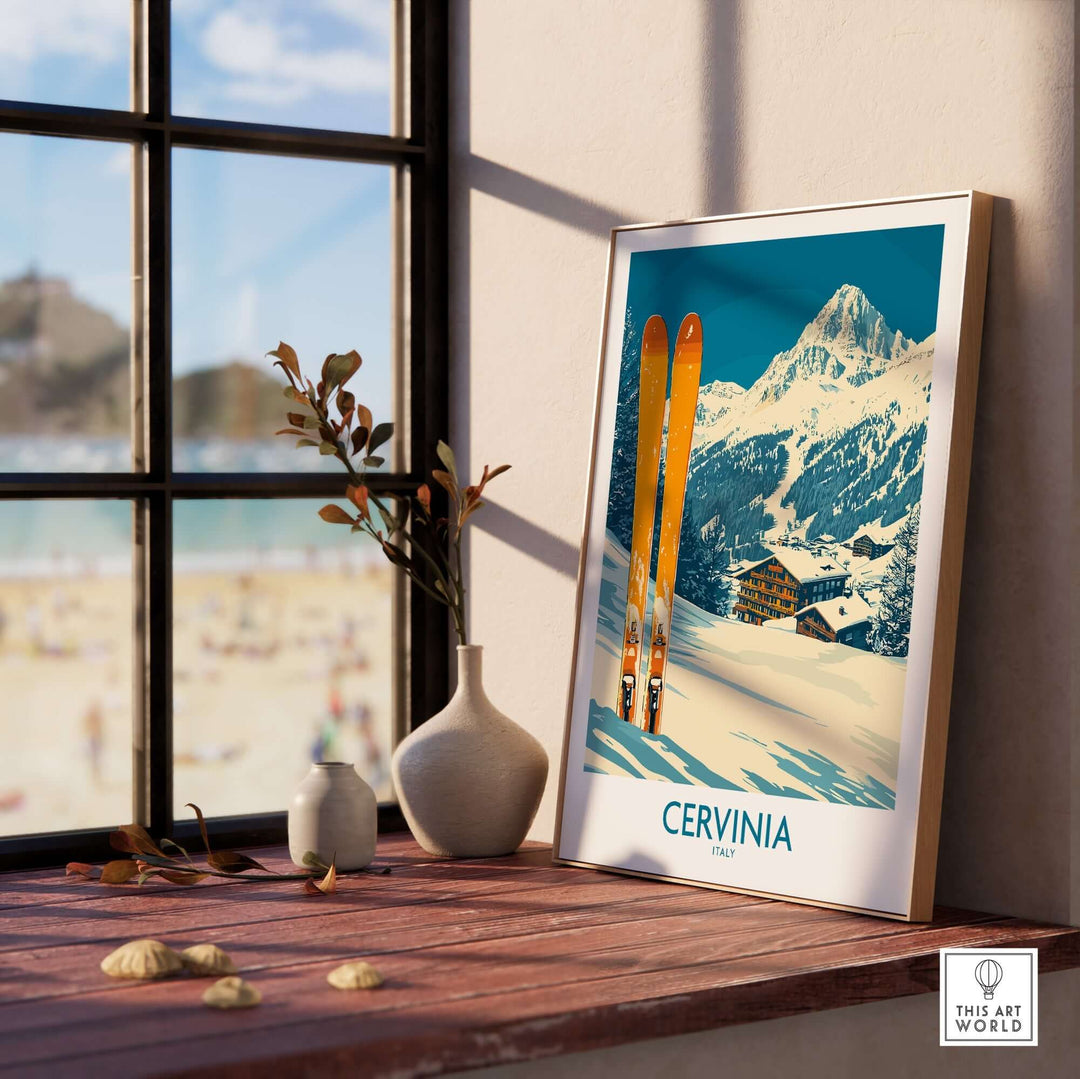 Cervinia ski wall art poster showcased on a wooden table with a scenic view of the Swiss Alps in the background.