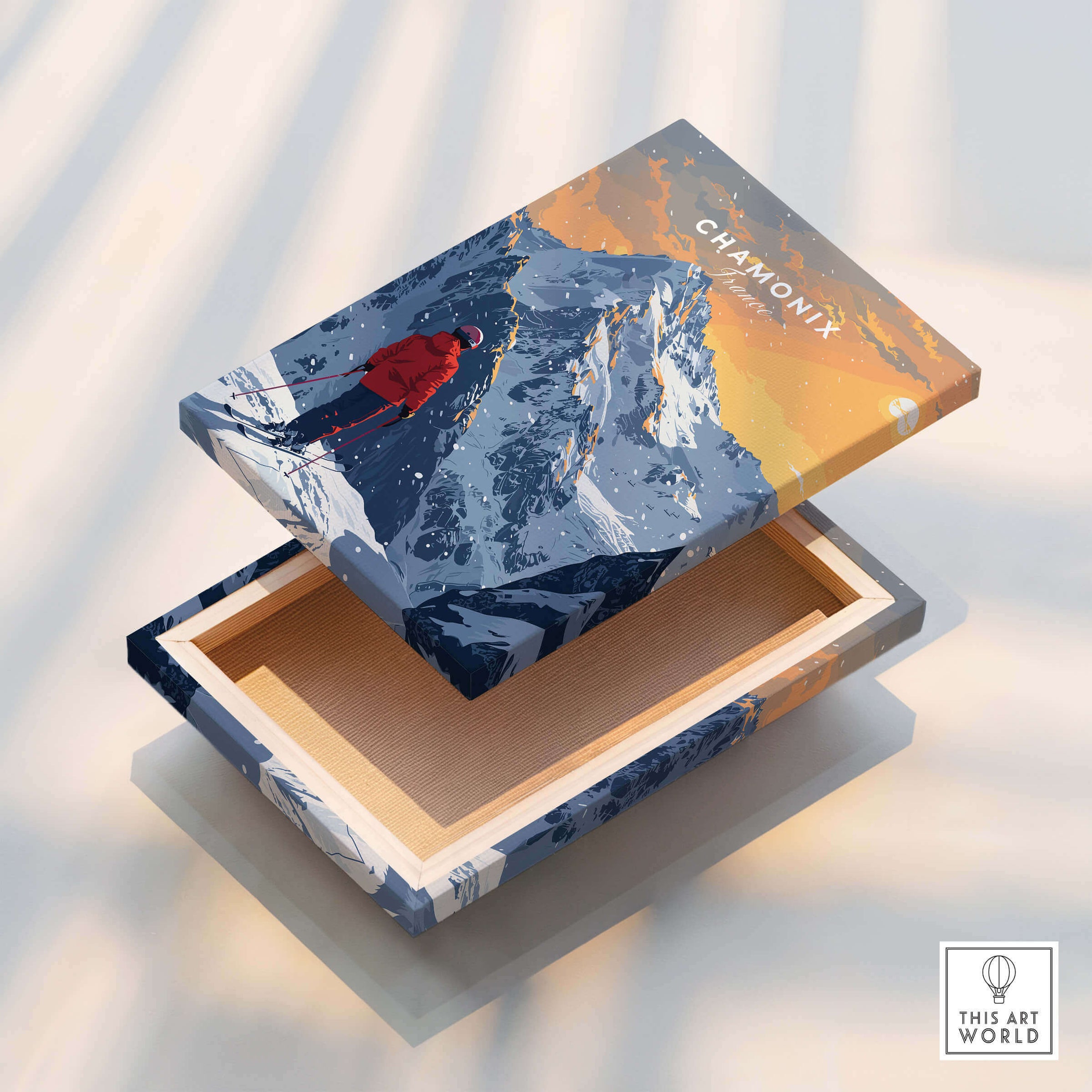 Chamonix Travel Poster -  France displayed on a beautifully designed box featuring snowy mountains and a skier.