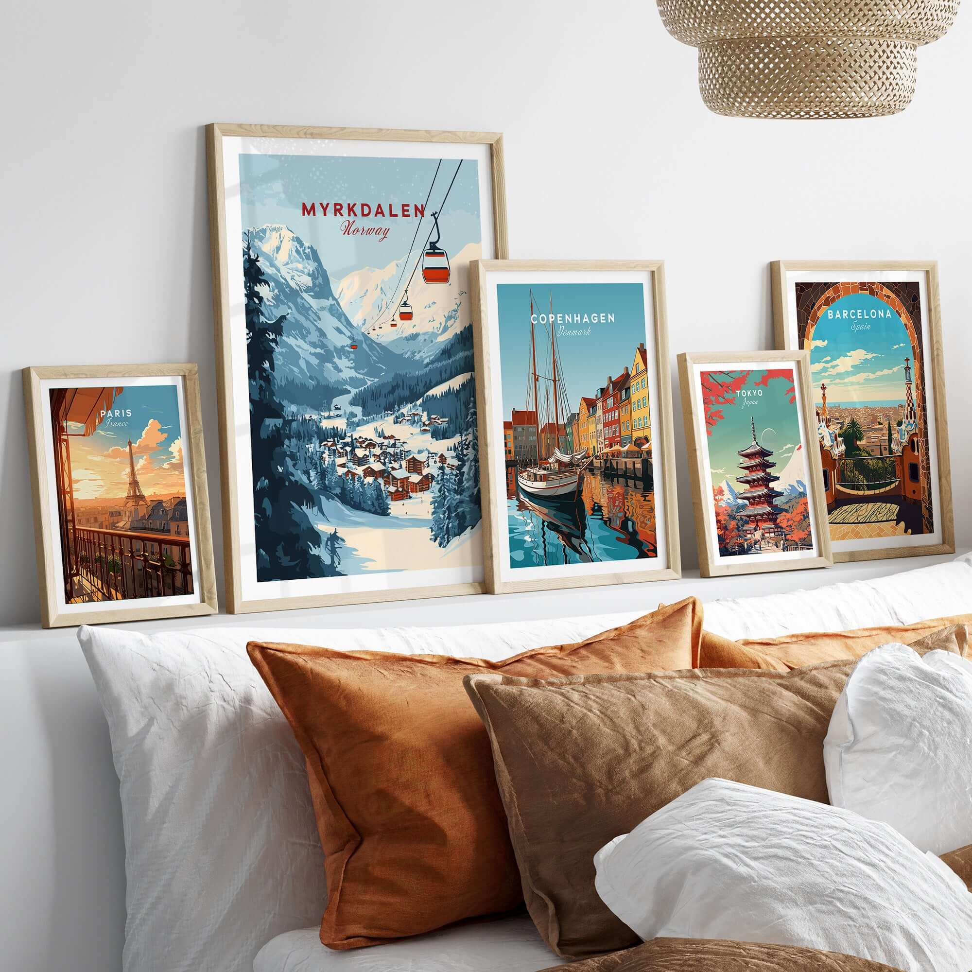 Charming Myrkdalen ski poster collection displayed above a cozy sofa, perfect for winter enthusiasts and home decor.
