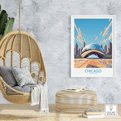 Chicago wall art print of 'The Bean', hanging in a modern living space with a cozy chair and decor elements.