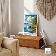 Chichester Harbour Art Print showcased in a stylish living room setting, featuring tranquil scenery and a boat.