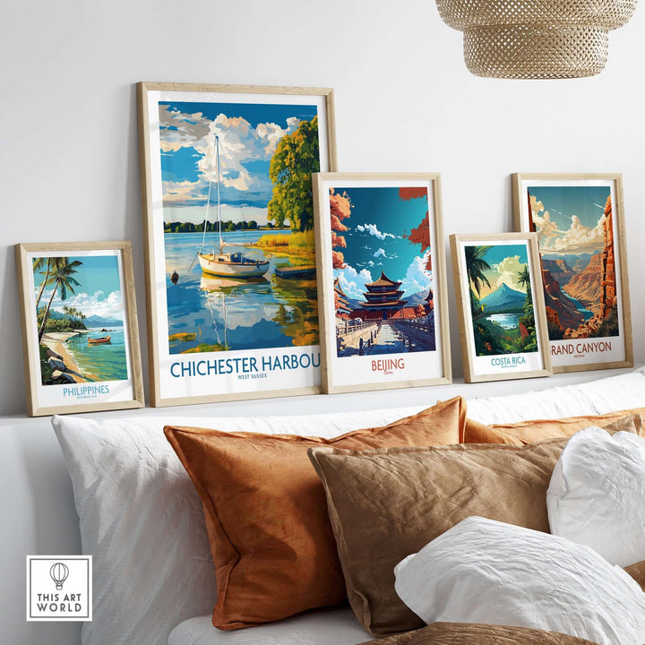 Chichester Harbour art print displayed among other travel posters in a stylish living room setting.