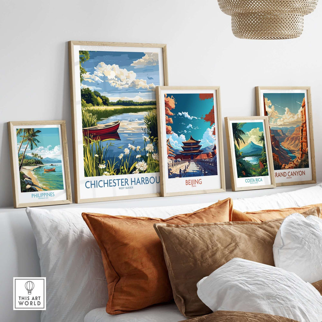 Chichester Harbour poster displayed with travel posters from Beijing, Costa Rica, and the Grand Canyon in a stylish interior setting.