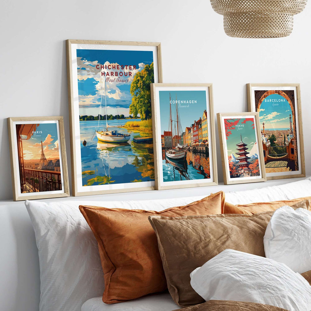 Chichester Harbour wall art displayed with travel-themed prints in a cozy living room setting.