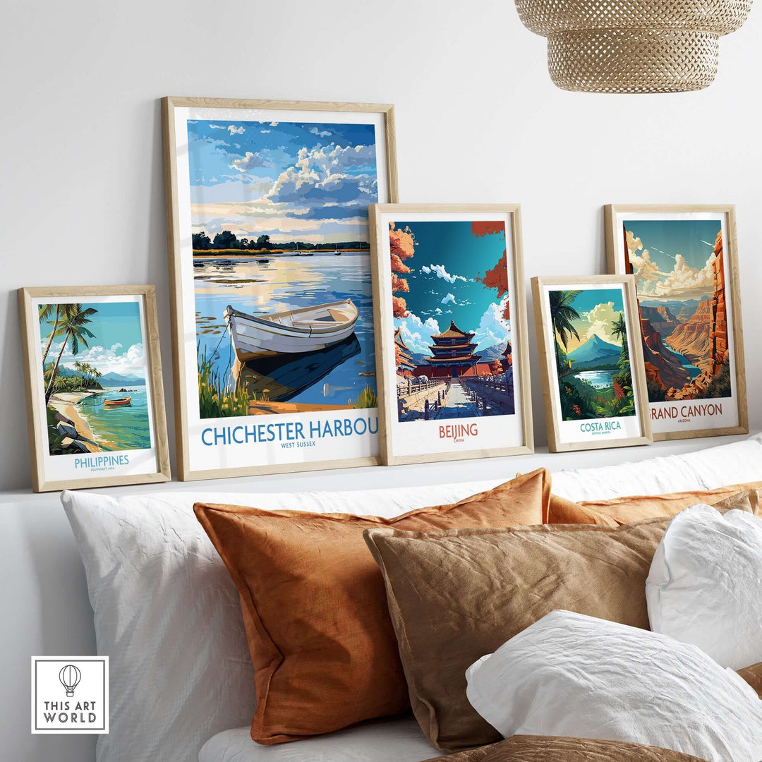 Chichester Harbour wall art print among other travel-themed prints in a stylish living room setting.