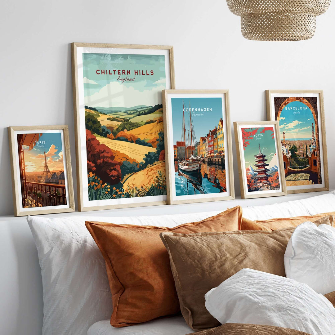 Chiltern Hills travel print showcased on a stylish wall above a cozy bed, surrounded by other vibrant travel prints.